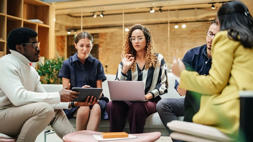 Diverse group of employees talking