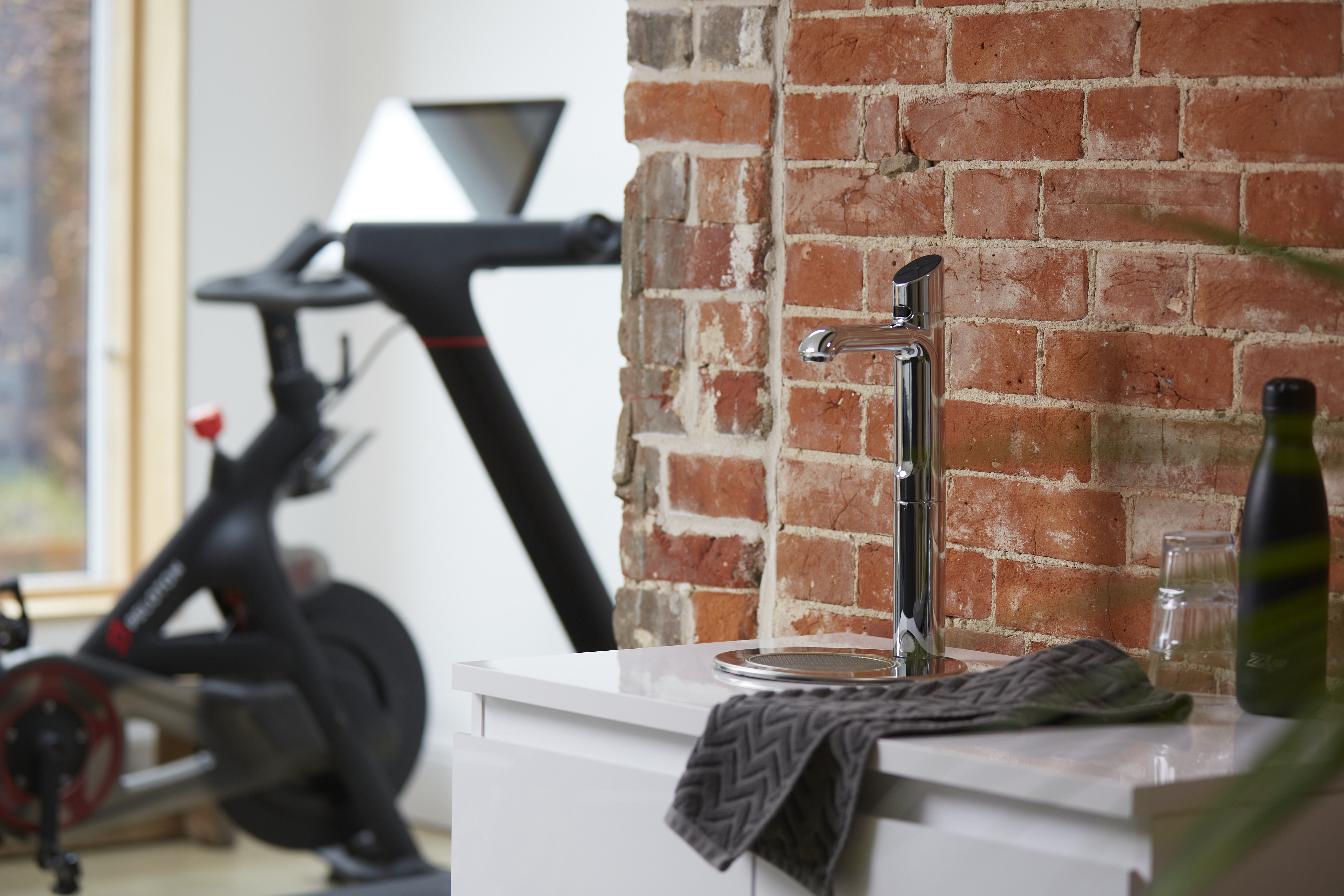 Interior designed gym with Zip HydroTap and Peloton bike
