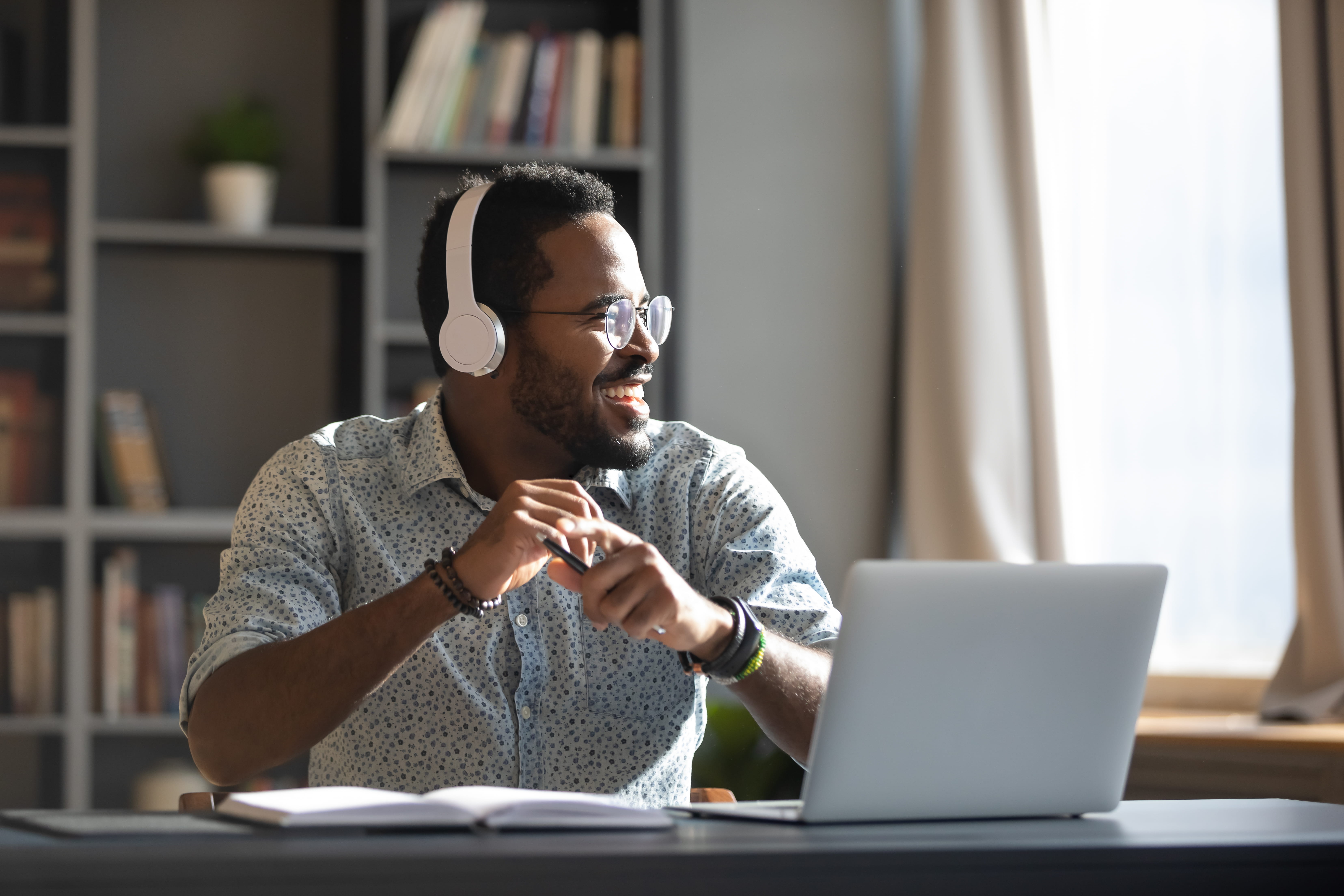 A happy worker in a home office