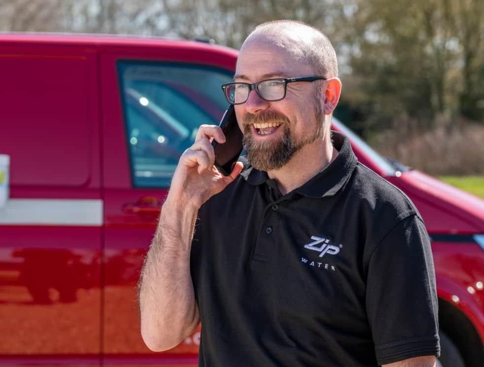 Zip HydroCare Engineer on phone